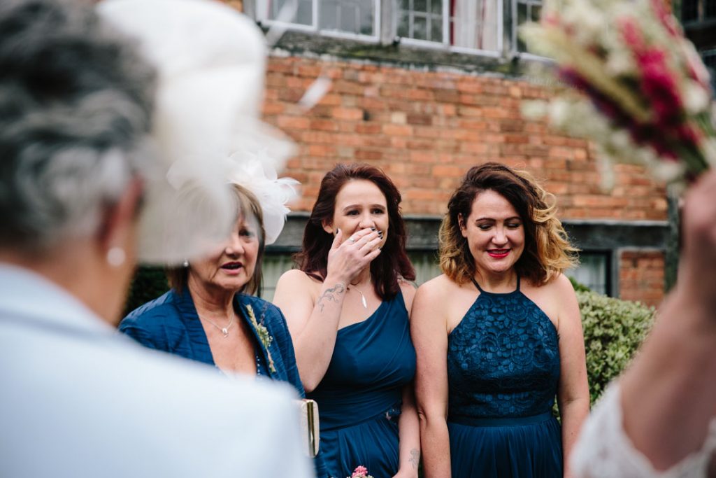 bridesmaids getting emotional on wedding day