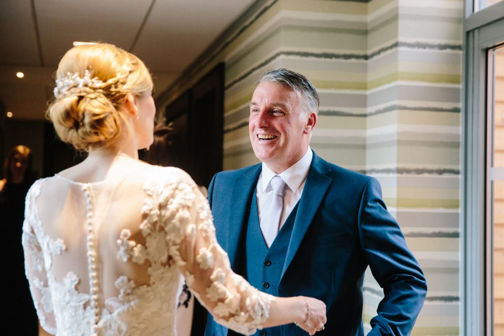 Dad seeing bride for the first time in her wedding dress at the Warwickshire golf club