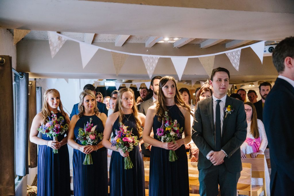 Bridesmaids and Best man during the wedding ceremony at the Saxon Mill