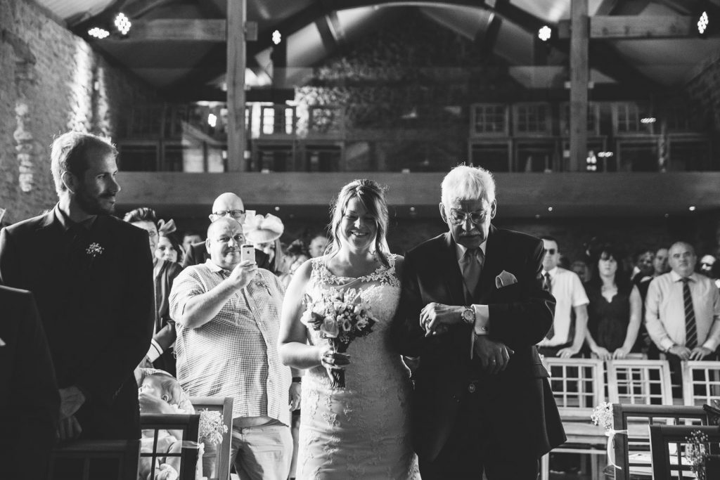 Father and Bride walking down the aisle at Dodford Manor