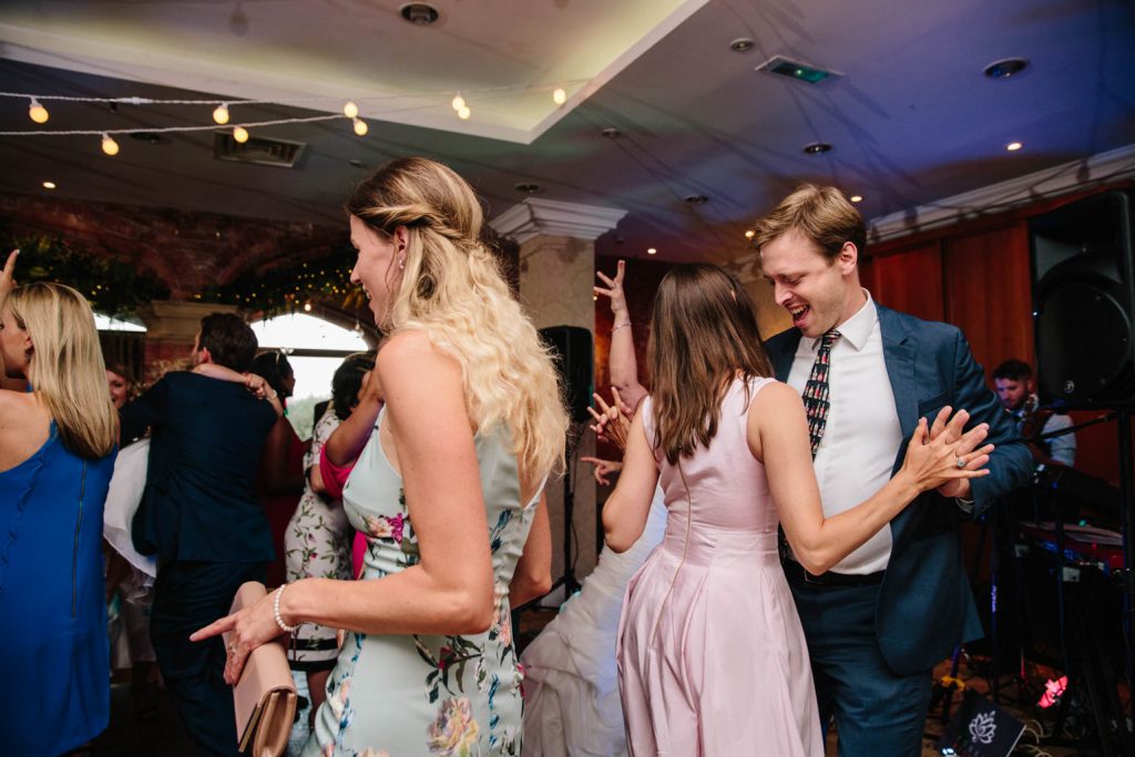 Guests dancing at a wedding at The Welcombe Hotel