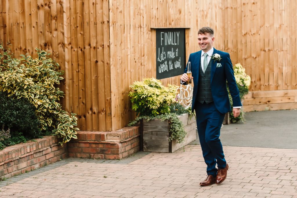 Groom arriving at wootton park for his wedding