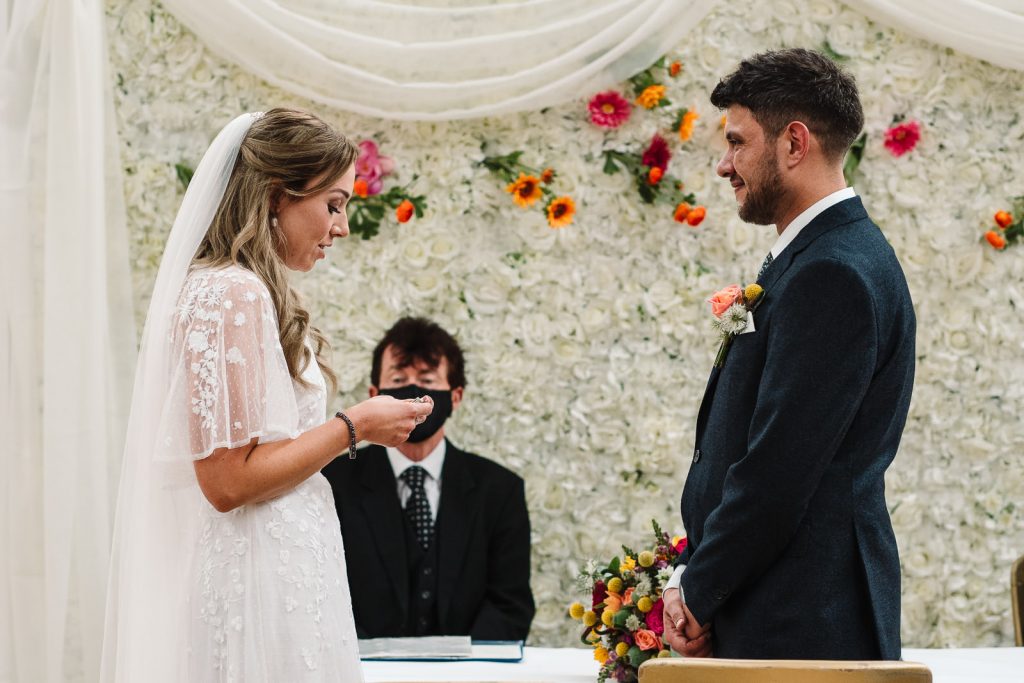 bride reading her vows during Old Library wedding ceremony